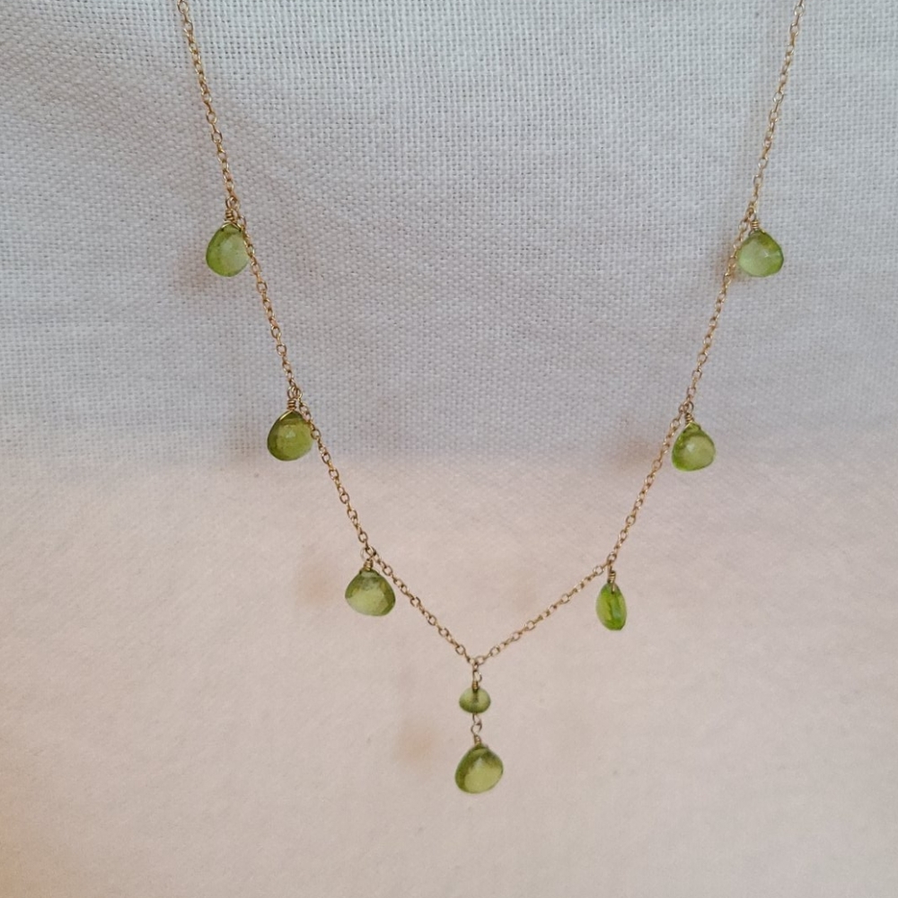 Peridot and gold necklace